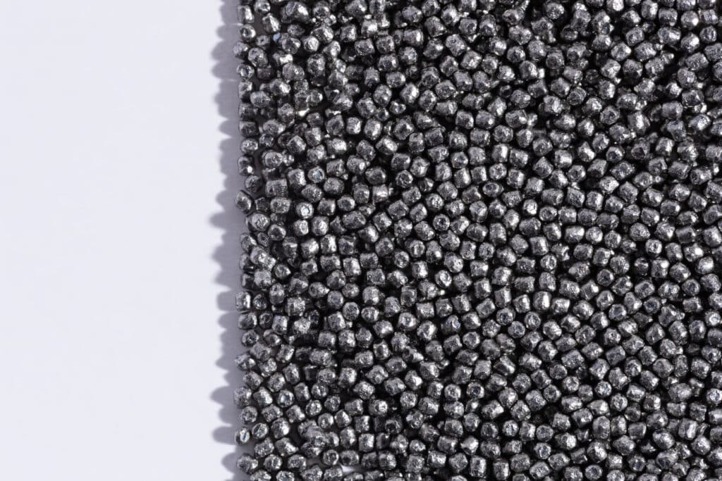 Close-up of conditioned cut wire abrasives for shot peening and surface preparation.jpg